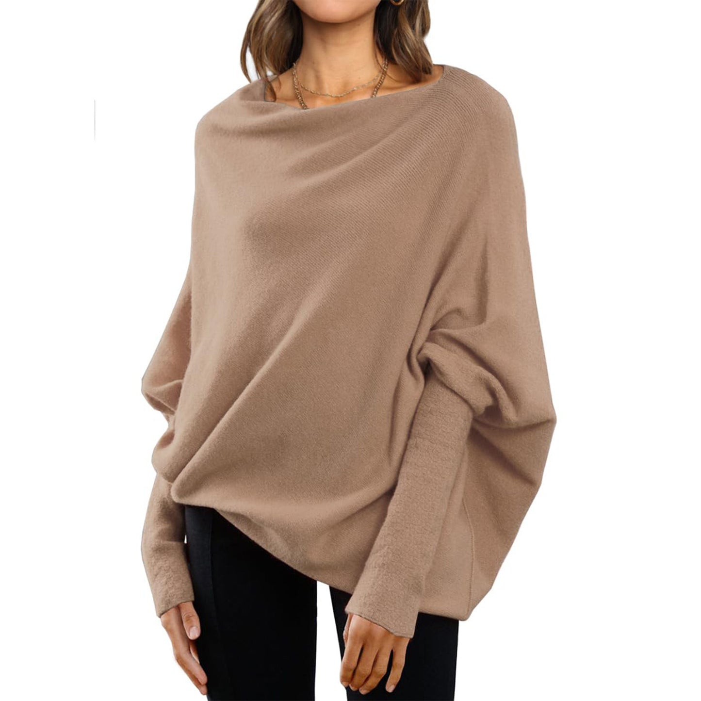 "Loose Bat Sleeve Sweater Tops – the perfect blend of simplicity and casual fashion. Designed with a versatile solid color and a classic round neck, this sweater offers effortless style and comfort for any occasion."